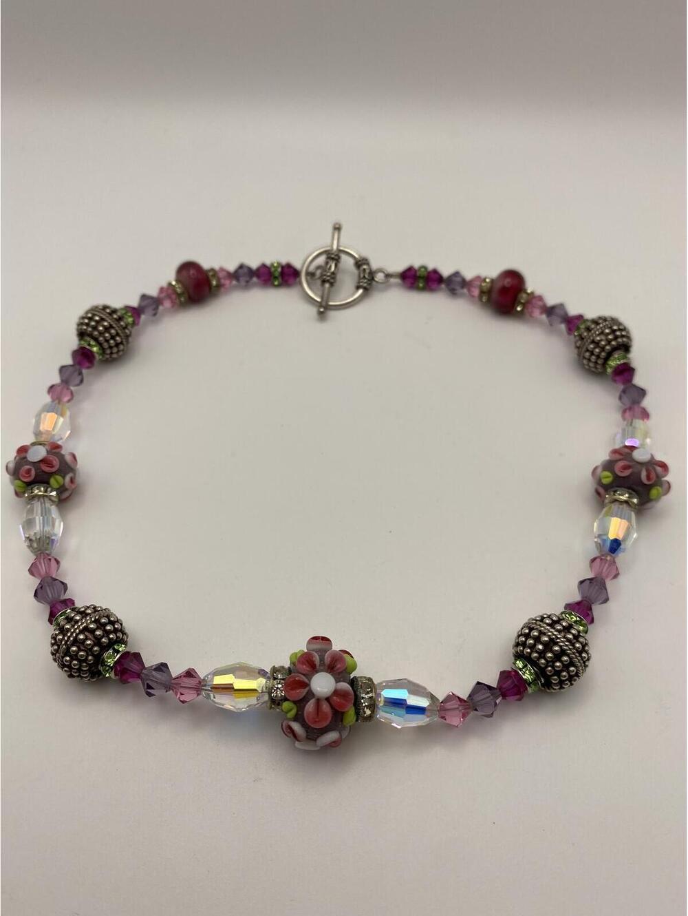 Handcrafted Purple and Silver Beaded Necklace with Floral Accent